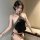 Vintage-inspired black lingerie set featuring an embroidered backless wrap bodice with adjustable ties, perfect for a classic...