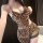 Sexy leopard print lace sleepwear set for women, featuring elegant design and flirty details, perfect for intimate wear.