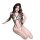 Woman wearing leopard print lingerie set with black straps and beige cups, featuring a seductive design for sleepwear.