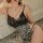 Seductive sheer black lace top paired with leopard print open-crotch sleepwear, elegant and daring design for pure allure.
