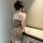 Woman wearing leopard print lace sleep dress with built-in pads, showcasing seductive back design for small bust enhancement.