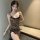 Woman wearing leopard print lace sleep dress with built-in pads, featuring thin straps and bow details for small bust enhance...