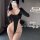 A woman poses in a black bodysuit featuring an open-crotch design, highlighting its sexy and seductive style. the uniform set...