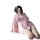 A woman poses with her back turned, wearing a pink floral japanese-style kimono robe set. the ensemble features delicate lace...
