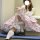 A person wearing an original lolita petticoat featuring boneless crystal tulle, soft design, and ultra-voluminous fabric, per...