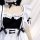 Japanese black and white maid dress with ruffled sleeves and corset detail, perfect for lolita cosplay outfits.