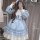 A woman wearing a light blue japanese cosplay maid dress set, featuring long sleeves, ruffled layers, and lace details, perfe...