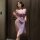 Woman wearing lavender lace split long dress lingerie set, sensual sheer sleepwear perfect for summer nights.