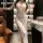 Woman wearing mannyan sexy lace temptation long dress with high slit, bodycon fit, and sheer floral lace detailing in elegant...