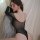 Sexy black sheer bodysuit with sparkling details, long sleeves, open back design, perfect for women seeking elegant and darin...