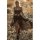 A woman walks through a field wearing a black muse maxi dress with white mesh details, featuring a high slit and flowing fabr...
