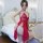 Elegant red lace sleep dress with sheer mesh design, deep v-neckline, and flowing fabric for womens nightwear.