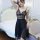 Elegant black lace sleep dress with sheer mesh design, deep v-neckline, and flowing skirt for womens nightwear.