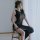 Elegant black sheer design dress with deep neckline and thigh slit, perfect for evening events and club outings.