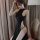 Elegant black high-slit cheongsam-style nightwear with sheer design, perfect for seductive allure and stylish elegance.