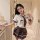 A woman wearing a cosplay student uniform, featuring a white blouse with a plaid tie and skirt, suitable for jk style erotic ...