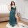 A plus-size model showcases a sexy lace long dress set, featuring a semi-sheer backless design and transparent elements, perf...
