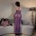 Seductive sheer lace lingerie set featuring a sexy mesh bodysuit with long sheer skirt, perfect for women seeking elegance an...