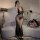Seductive sheer lace lingerie set featuring a sexy mesh bodysuit and long sheer skirt, perfect for women seeking elegance and...