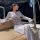 Elegant long-sleeve sheer dress with sexy backless design, perfect for summer vacations. ideal cover-up dress featuring tropi...
