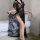 Woman wearing sexy lace transparent long nightgown set, romantic bedroom lingerie with floral details and open front design.