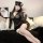 Woman wearing sheer mesh long sleeve sexy sleep dress with bodycon fit, paired with a police hat and choker.