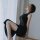 Elegant black dress with sheer design, perfect for evening events. ideal for women seeking allure and sophistication. plus si...