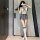 Woman modeling love-ruru jk uniform set with bodysuit, pleated skirt, and striped knee-high socks in seductive schoolgirl sty...