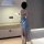 Woman wearing love-ruru sexy lace corset set – a nightclub-style off-shoulder mini dress with high slit skirt, shown from bac...