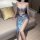 Woman wearing love-ruru sexy lace corset set, featuring off-shoulder top and high-slit skirt in shimmering blue for nightclub...