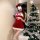 A woman poses next to a christmas tree wearing a red luoliya christmas lingerie set, perfect for festive events and cosplay a...