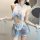 Woman wearing machu chu maid costume set - cute sheer blue and white lingerie with ruffles, bow, apron, and wrist ties.