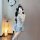 Woman wearing machu chu maid costume set - cute sheer blue and white lingerie with apron, headpiece, and thigh highs.
