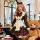 A charming maid outfit featuring a sweet french-inspired design, complete with puffed sleeves and an apron, perfect for a del...