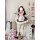 A woman models a maid costume cosplay dress, featuring a black and white outfit with a pink bow, lace details, and a petticoa...