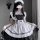 A woman wearing a maid costume cosplay dress, featuring a black and white design with ruffles and a bow headband. perfect for...