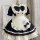 Cute maid costume cosplay dress featuring a black and white design with ruffles, bow, and paw print detail, perfect for anime...