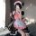 A woman poses in a maid costume cosplay dress, featuring a cute anime cat design, perfect for lolita outfits.