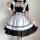 A woman wearing a black and white maid costume cosplay dress, featuring ruffled sleeves, a corseted bodice, and layered skirt...