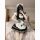 A woman poses in a maid costume cosplay outfit, featuring a cute anime cat girl design with a lolita dress. the ensemble incl...