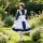 A woman wearing a charming maid dress cosplay costume, perfect for sweet lolita style. the outfit features a navy blue and wh...