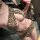 Woman wearing man yan spicy leopard print mini skirt, a sexy bodycon nightclub dress perfect for bold date night outfits.