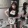 A stylish maid costume featuring a black and white outfit with cat-themed accessories, perfect for cosplay events or themed p...