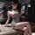 Elegant woman in manny night bodysuit, featuring lace sheer design, perfect for club settings. stylish and form-fitting.