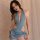 A woman models a stylish blue manny night one-piece outfit, featuring an open-crotch design and bodycon fit, perfect for club...