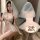 Woman in mannyan lingerie set - bridal bodysuit, provocative modest costume outfit, cosplay pure-temptation style ensemble.