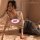Woman wearing mannyan sheer mesh nightgown with vintage chinese qipao style and student uniform inspired design, lounging on ...