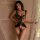 Woman wearing mannyan sensual lace bodysuit with sheer low-neck and open-crotch design, elegant black sleepwear.