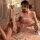 Woman wearing mannyan sensual lace lingerie set, japanese kimono style sheer mesh bra top with floral shimmer detail.