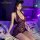 Woman wearing mannyan sexy lace bodysuit with deep v-neck and sheer bodycon skirt, styled as ol secretary costume.